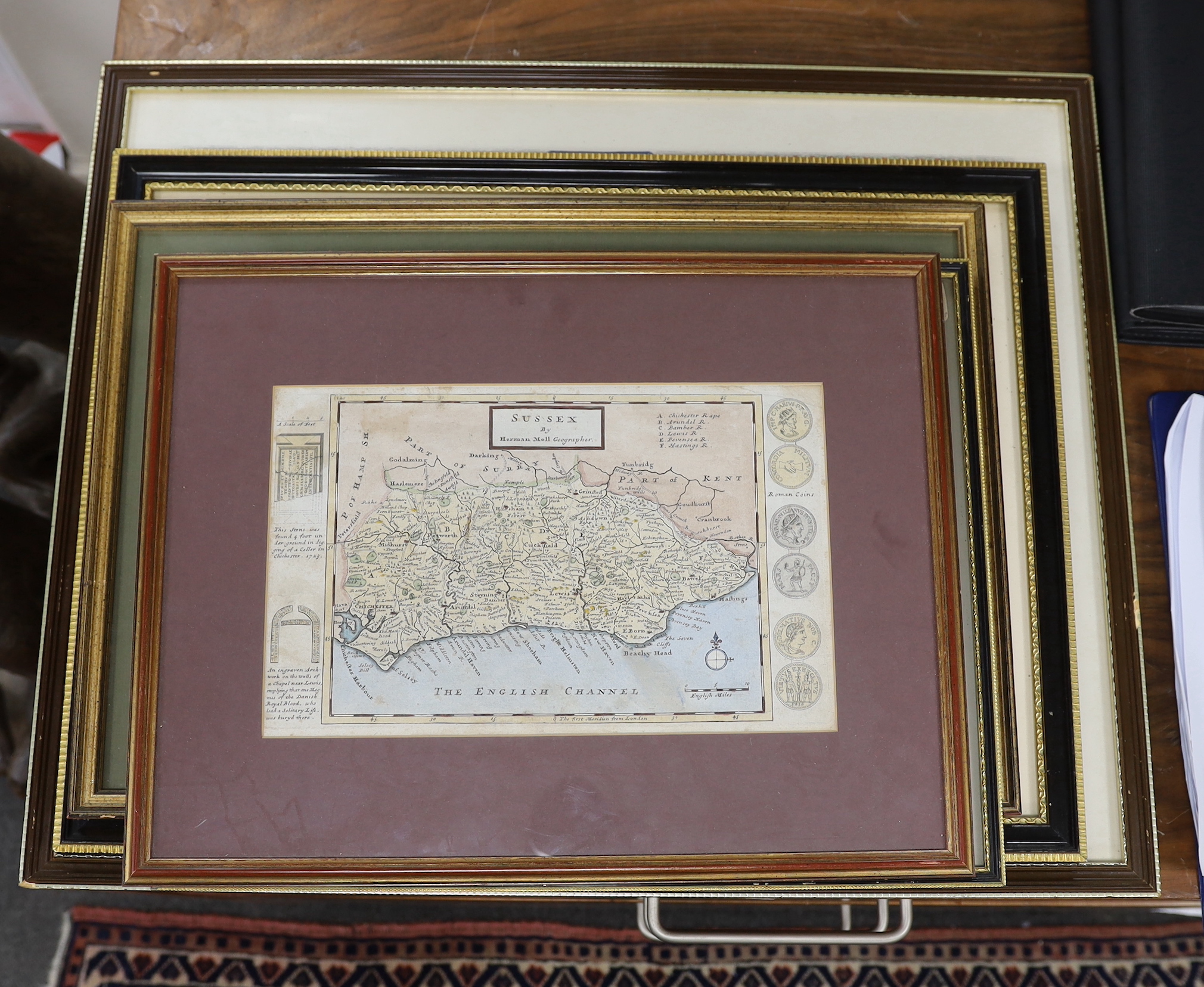 Five framed maps of Sussex, including four 18th century examples by Herman Moll, Johanes Norden, etc. largest 49 x 62cm